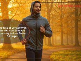 Man jogging on a park path during a golden autumn morning.
