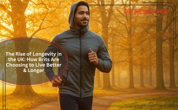 Man jogging on a park path during a golden autumn morning.