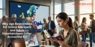 woman-holding-passport-and-phone-sitting-at-lapto