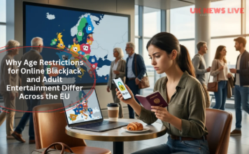 woman-holding-passport-and-phone-sitting-at-lapto